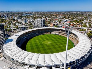 Aerial view of a sports ground in the city showcasing drone services and drone photography and video