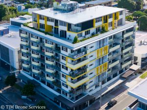 Aerial view of a commercial and residential property showcasing drone services to capture real estate and commercial property photos and videos