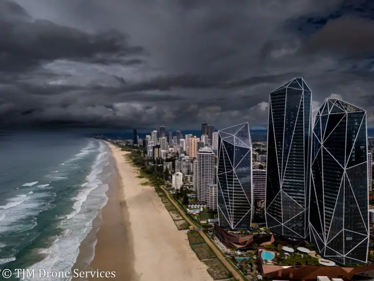 Aerial view of coastal landscape with commercial buildings on the beachfront showcasing drone photography and video,real estate landscape drone footage